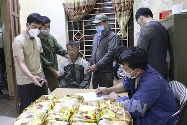 085315-dien-bien-bat-giu-2-doi-tuong-mua-ban-van-chuyen-21kg-ma-tuy-8-banh-heroin.jpg